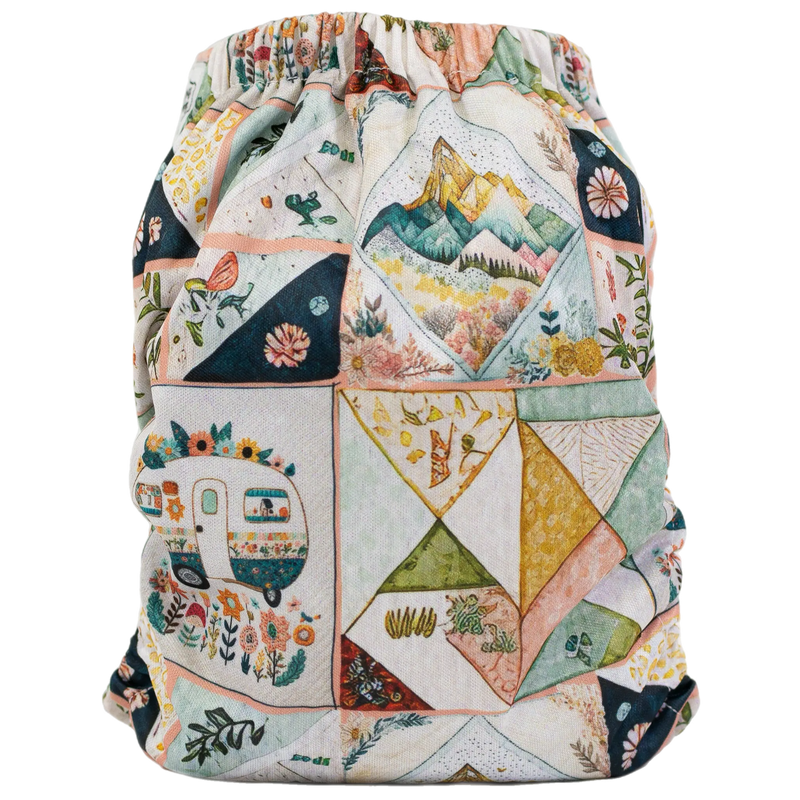 Colorful slim fit pocket cloth diaper with patchwork design, fits 8-40 lbs.