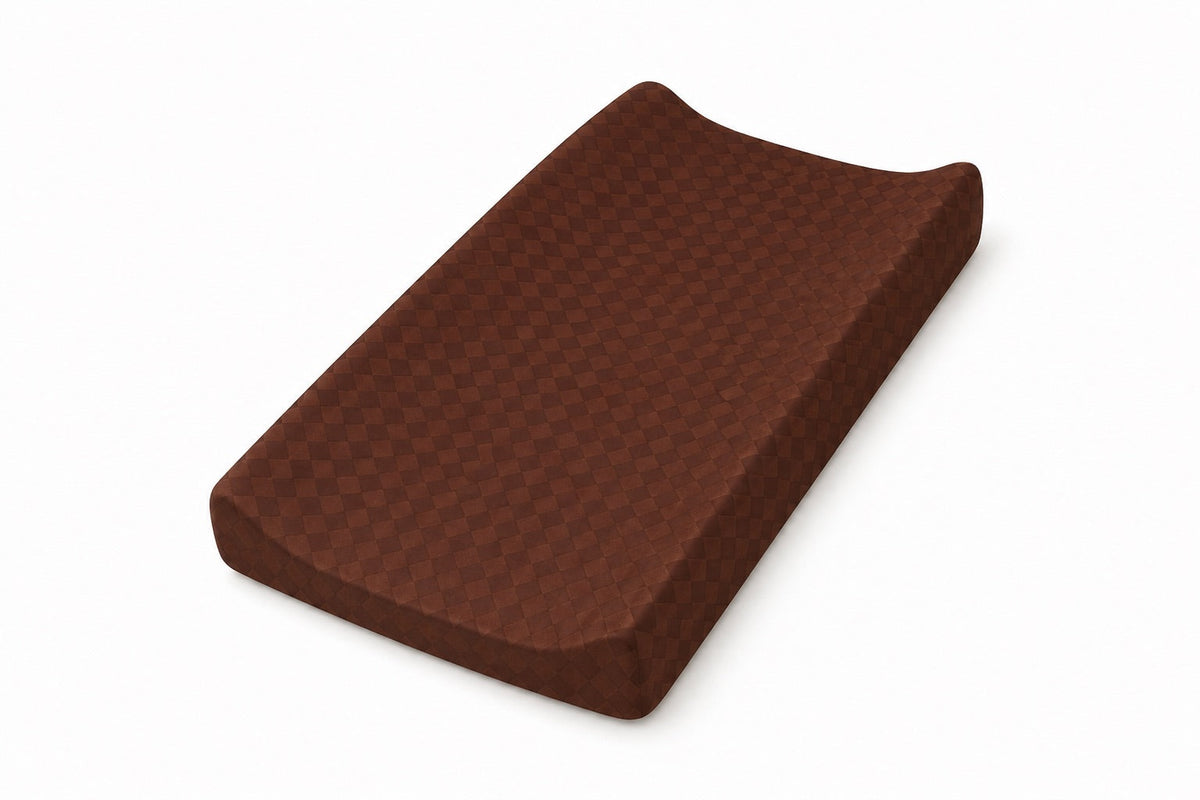 Changing pad cover in a brown and white diamond print