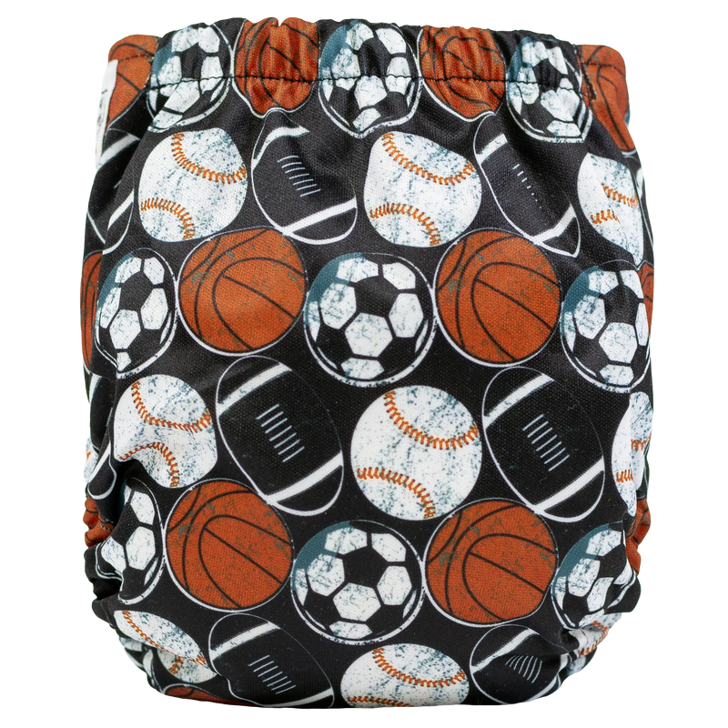 Tiny Tushies Newborn AIO Cloth Diaper with sports print pattern
