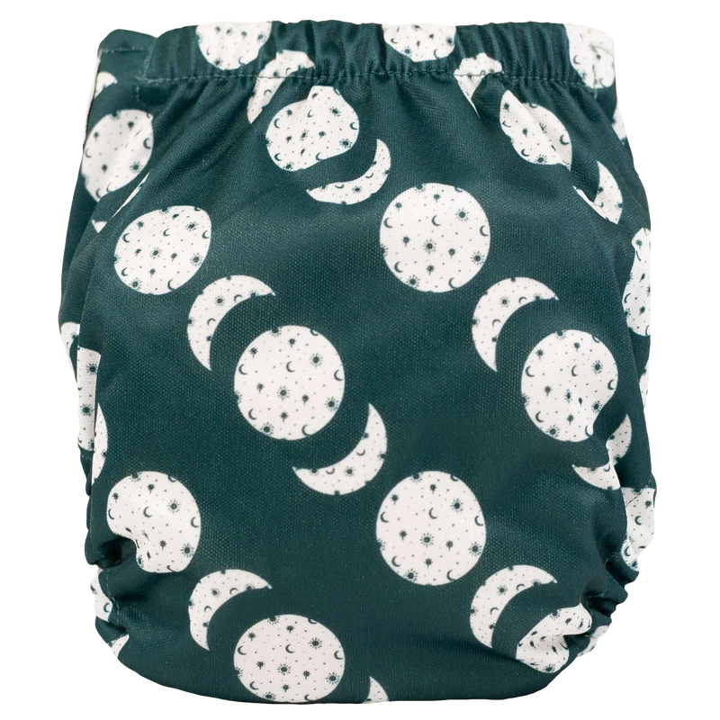 Tiny Tushies Newborn AIO Cloth Diaper with moon and star pattern.