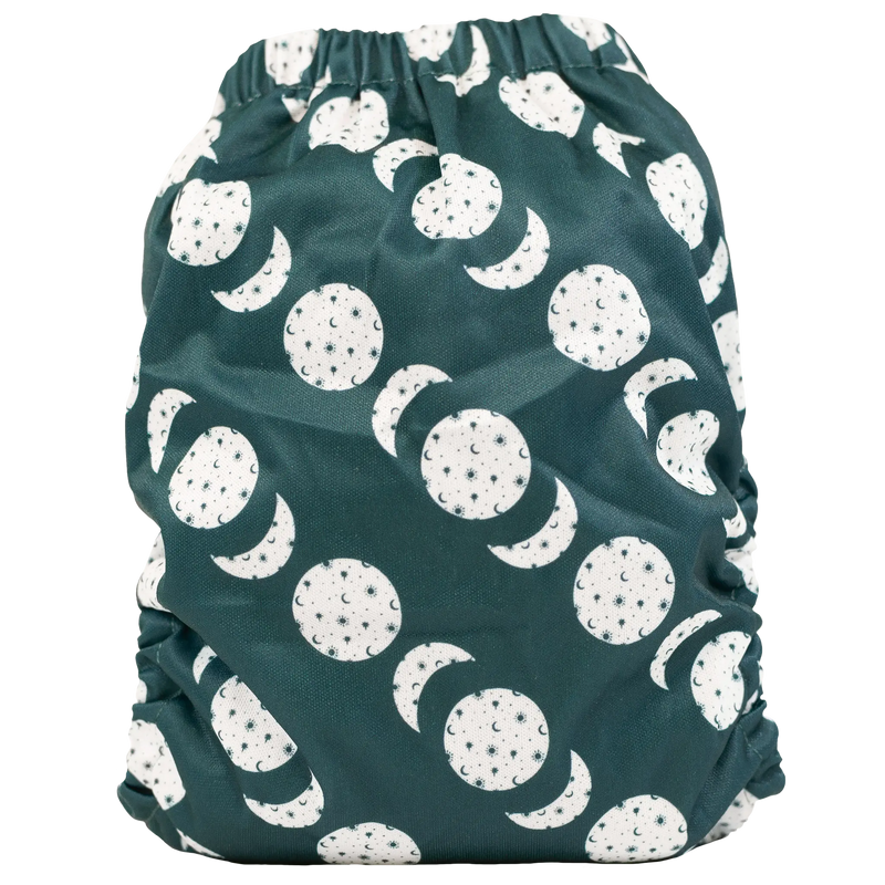 Slim fit pocket cloth diaper with moon pattern, adjustable snaps, and recycled waterproof material.