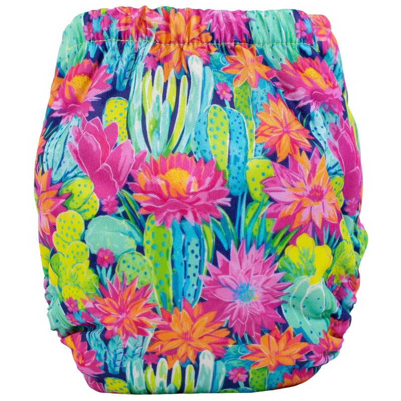 Tiny Tushies Newborn AIO Cloth Diaper with colorful floral and cactus print.