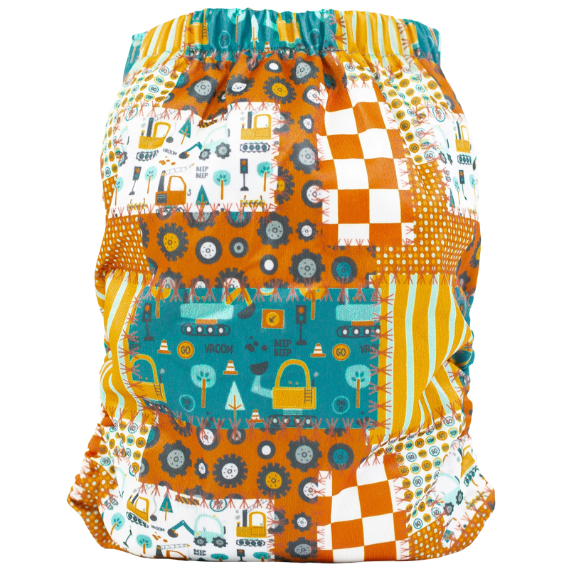 Slim Fit AIO Cloth Diaper with colorful printed design and adjustable snaps for babies 8-40lbs.