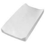 Little Mae & Co. Pearl White Ribbed Changing Pad Cover on a changing table in a modern nursery