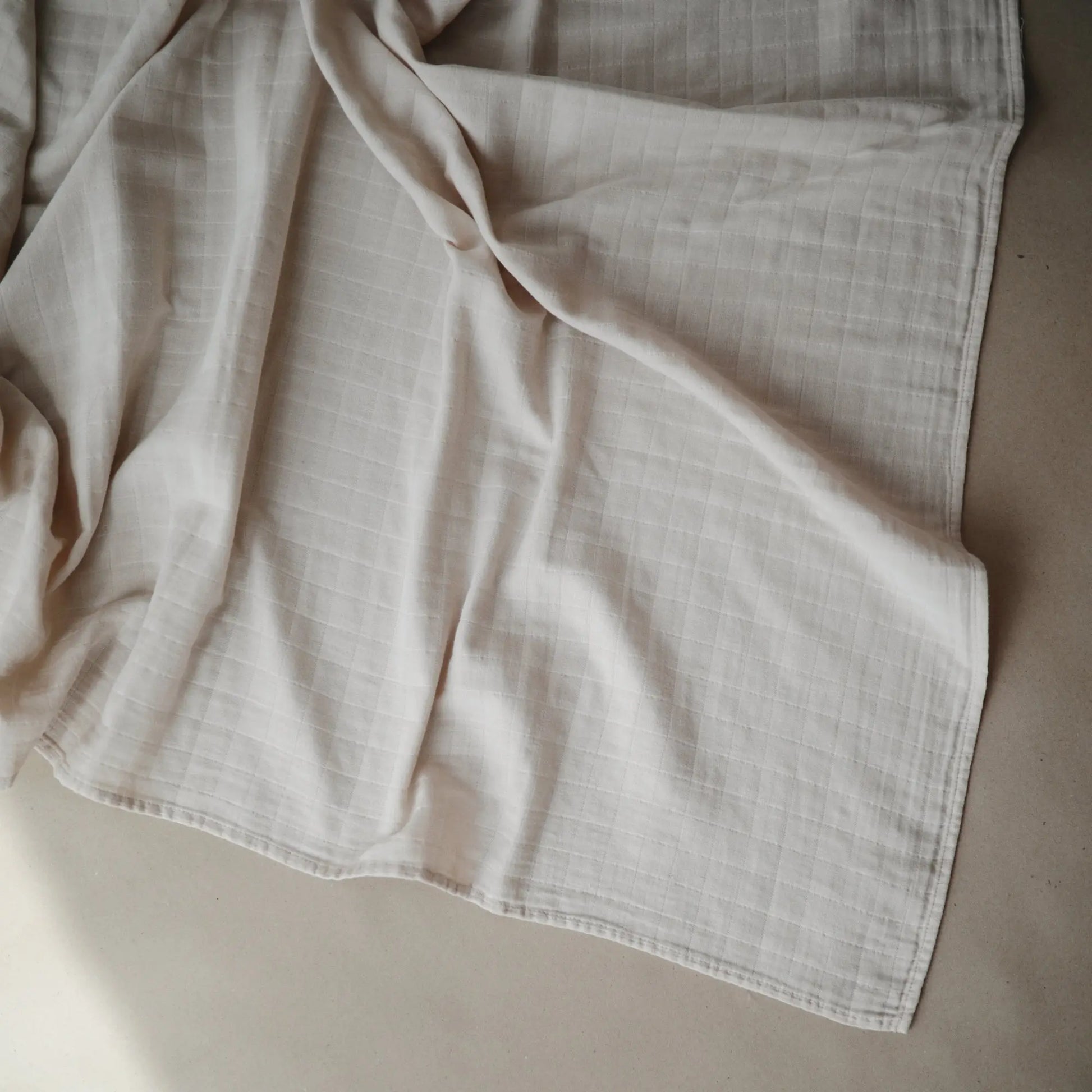 Organic Cotton Muslin Swaddle Blanket for Baby Cuddling and Nursing Mushie