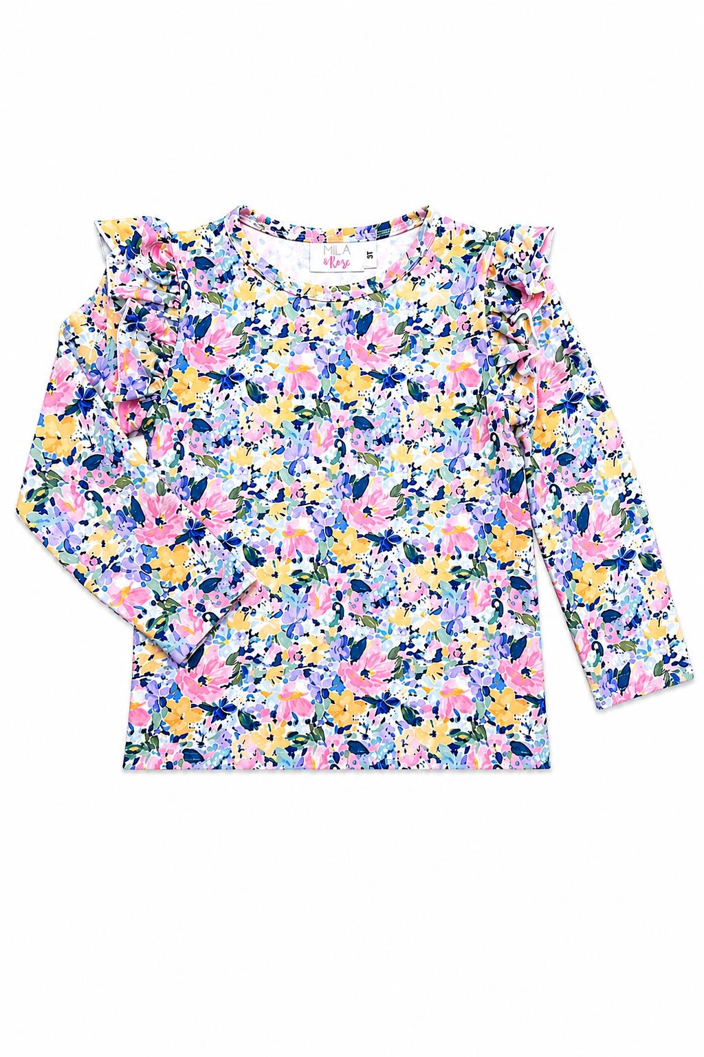 Long-sleeve girls' ruffle tee in a warm fall floral print with ruffle detail at the shoulders