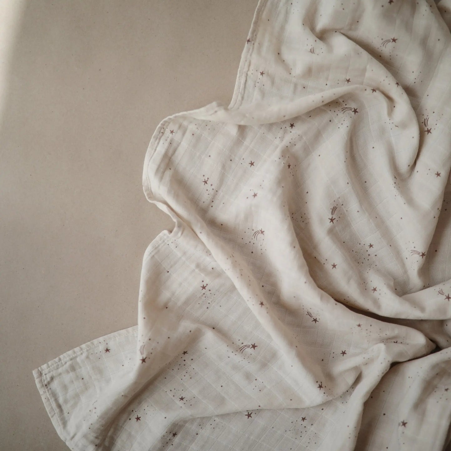 Organic Cotton Muslin Swaddle Blanket for Baby Cuddling and Nursing Mushie