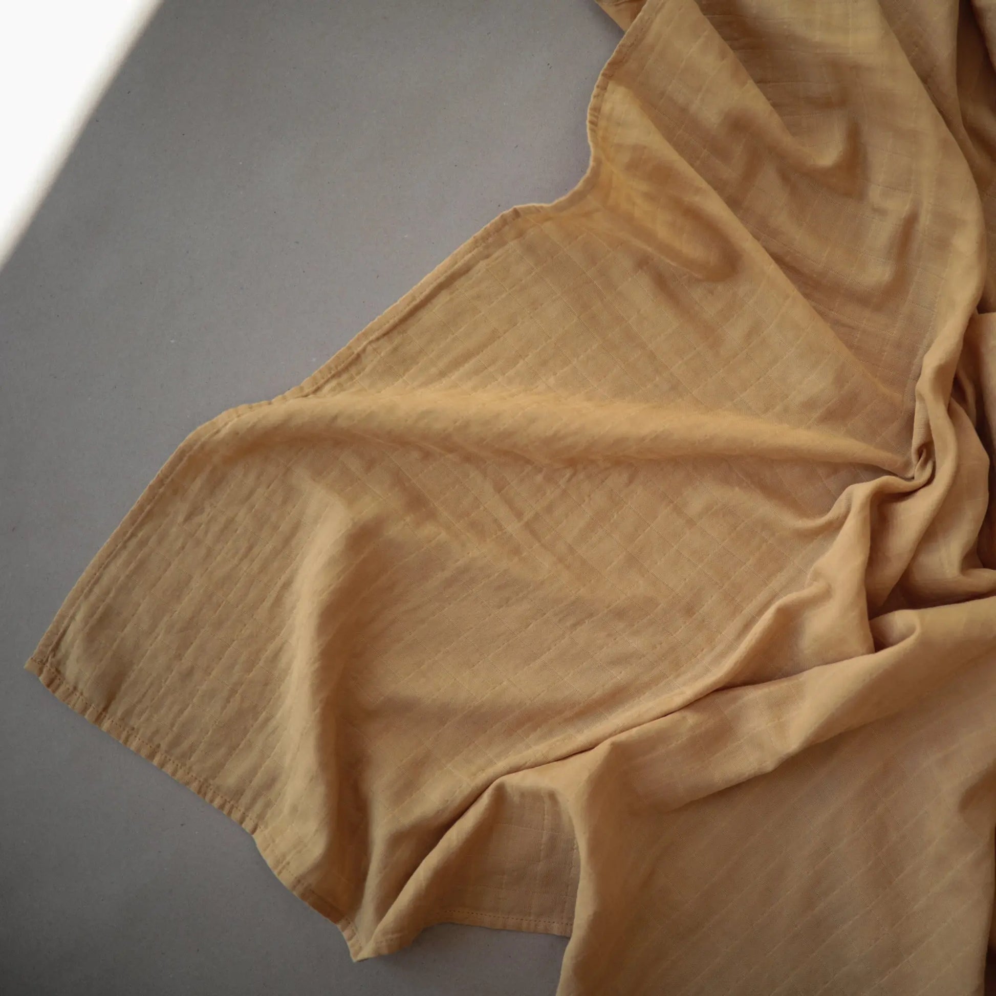 Organic Cotton Muslin Swaddle Blanket for Baby Cuddling and Nursing Mushie