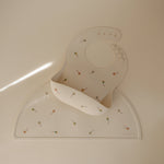 Mushie silicone placemat for baby and toddler mealtime.