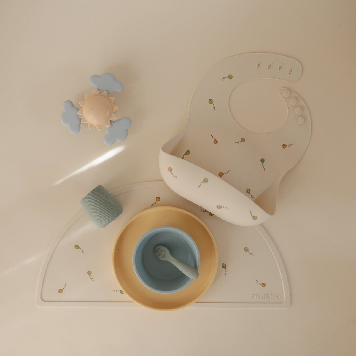 Mushie food-grade silicone baby placemat, non-slip & easy clean.