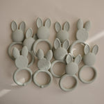 Mushie silicone bunny teether, soothing and safe for baby gums.