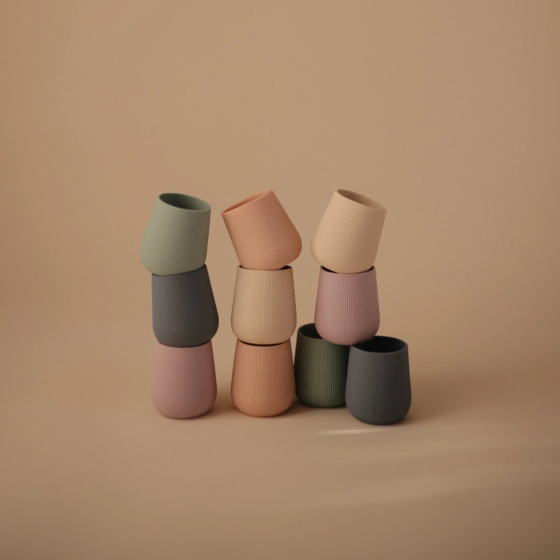 Silicone Starter Cup for Babies with Ribbed Texture and Weighted Base for Easy Transition from Bottle to Cup Mushie