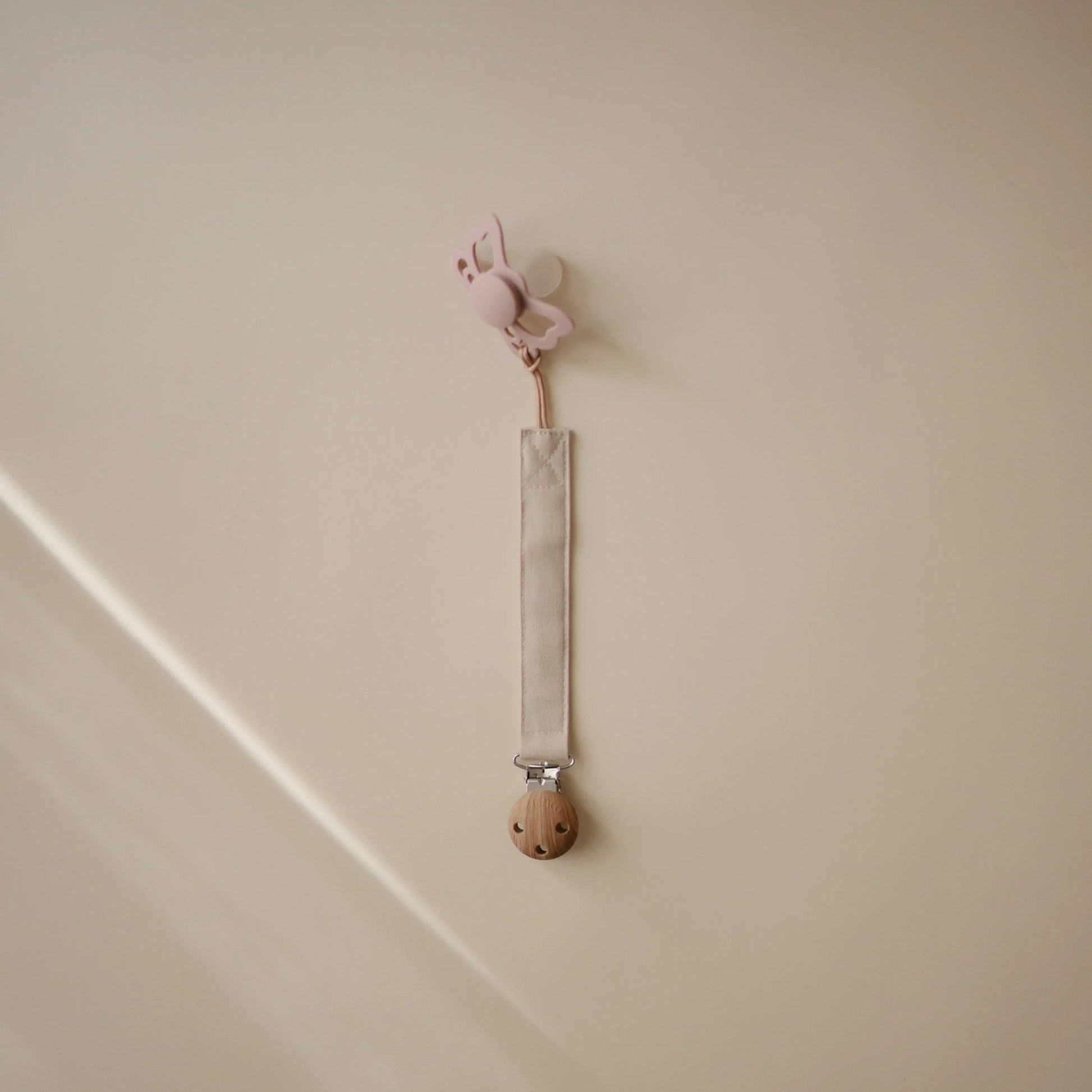Linen Pacifier Clip Two Pack with Water Resistant Coating and Faux Wood Silicone Clasp Mushie