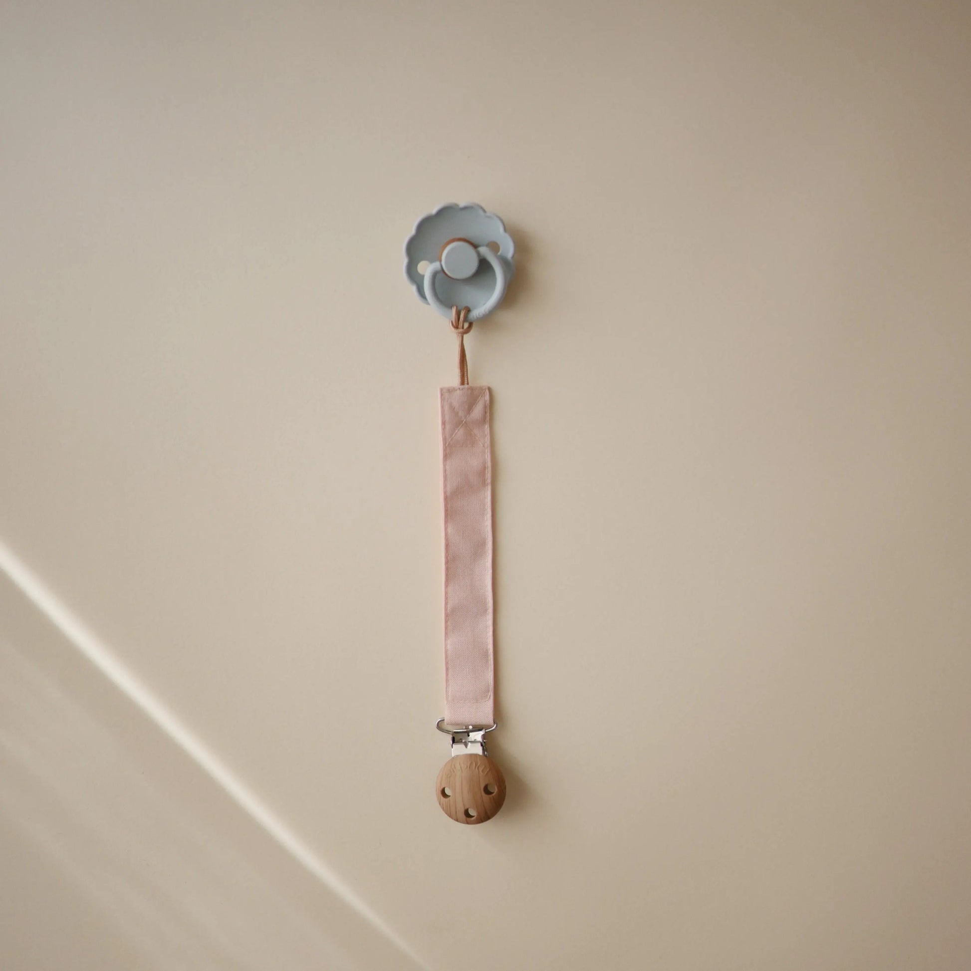 Linen Pacifier Clip Two Pack with Water Resistant Coating and Faux Wood Silicone Clasp Mushie