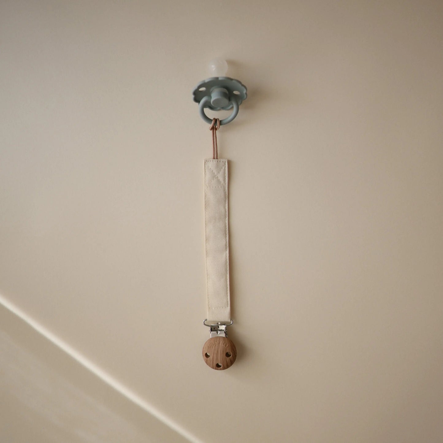Linen Pacifier Clip Two Pack with Water Resistant Coating and Faux Wood Silicone Clasp Mushie