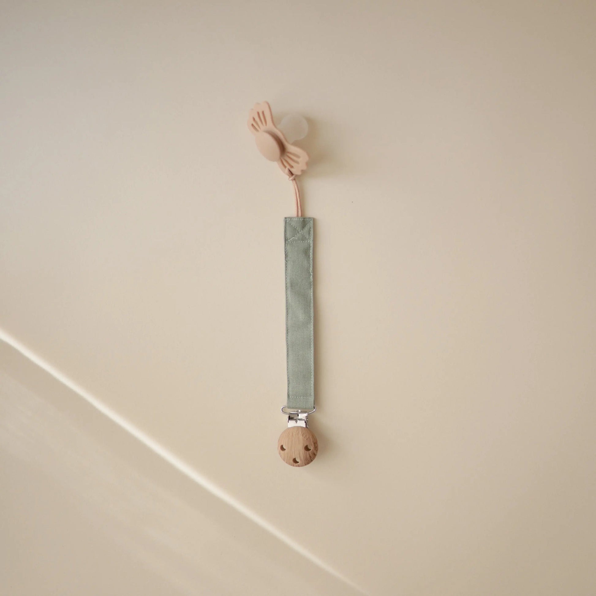 Linen Pacifier Clip Two Pack with Water Resistant Coating and Faux Wood Silicone Clasp Mushie