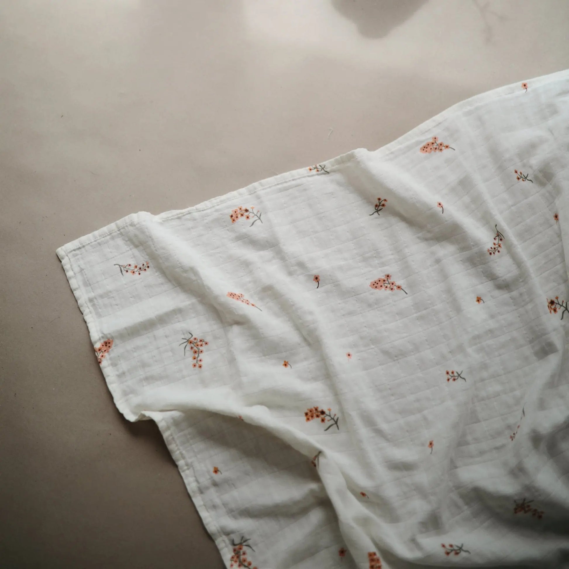 Organic Cotton Muslin Swaddle Blanket for Baby Cuddling and Nursing Mushie