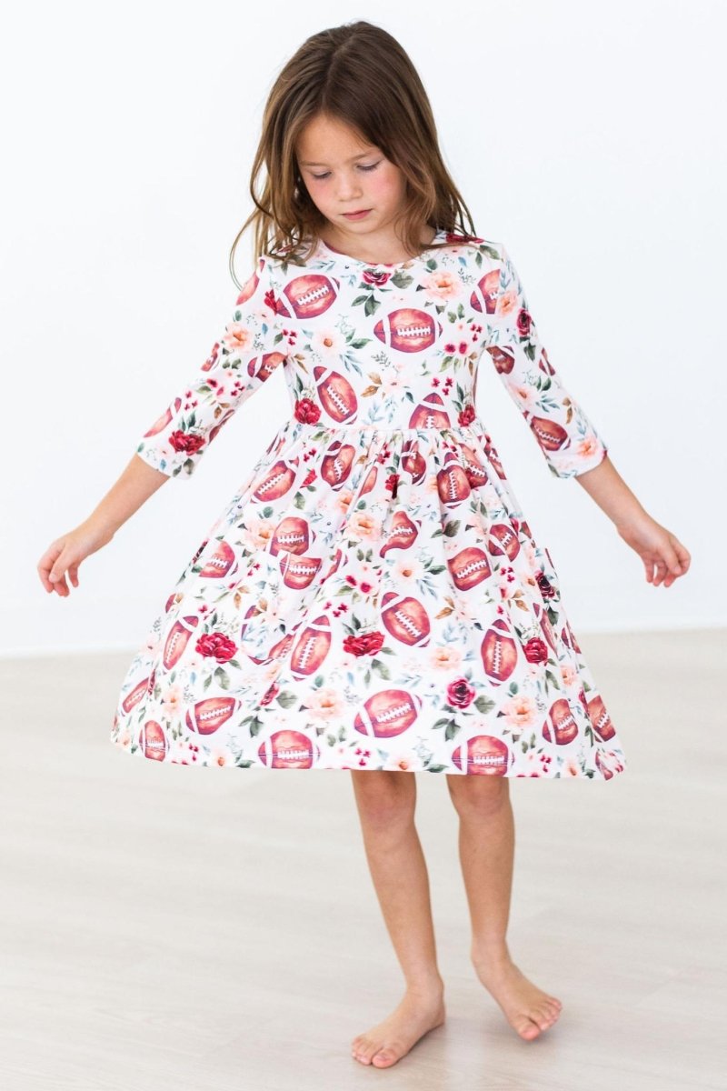 Mila & Rose ® Footballs and Flowers Twirl Dress Pockets 3QuarterSleeve - Everetts Place Boutique - 