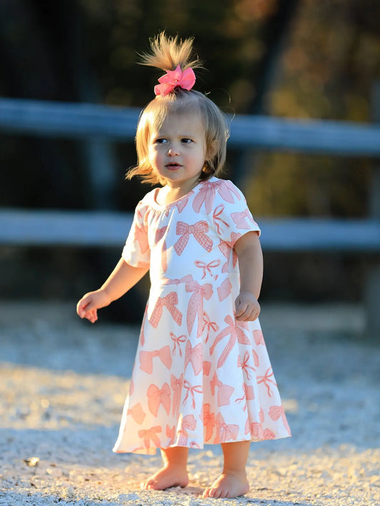 Girls Dress with Bow Print Comfortable and Stylish 95 Percent Polyester 5 Percent Spandex Rylee Faith Designs Everetts Place: Online Boutique
