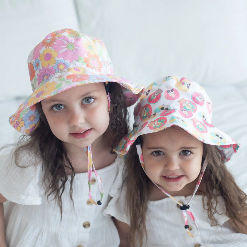 Retro floral baby and kids sun hats for UV protection.