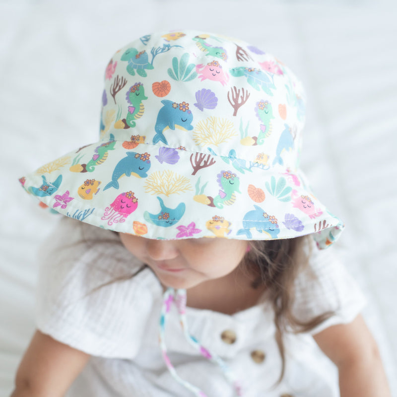 Baby and kids sun hat with undersea adventure print and UV protection.