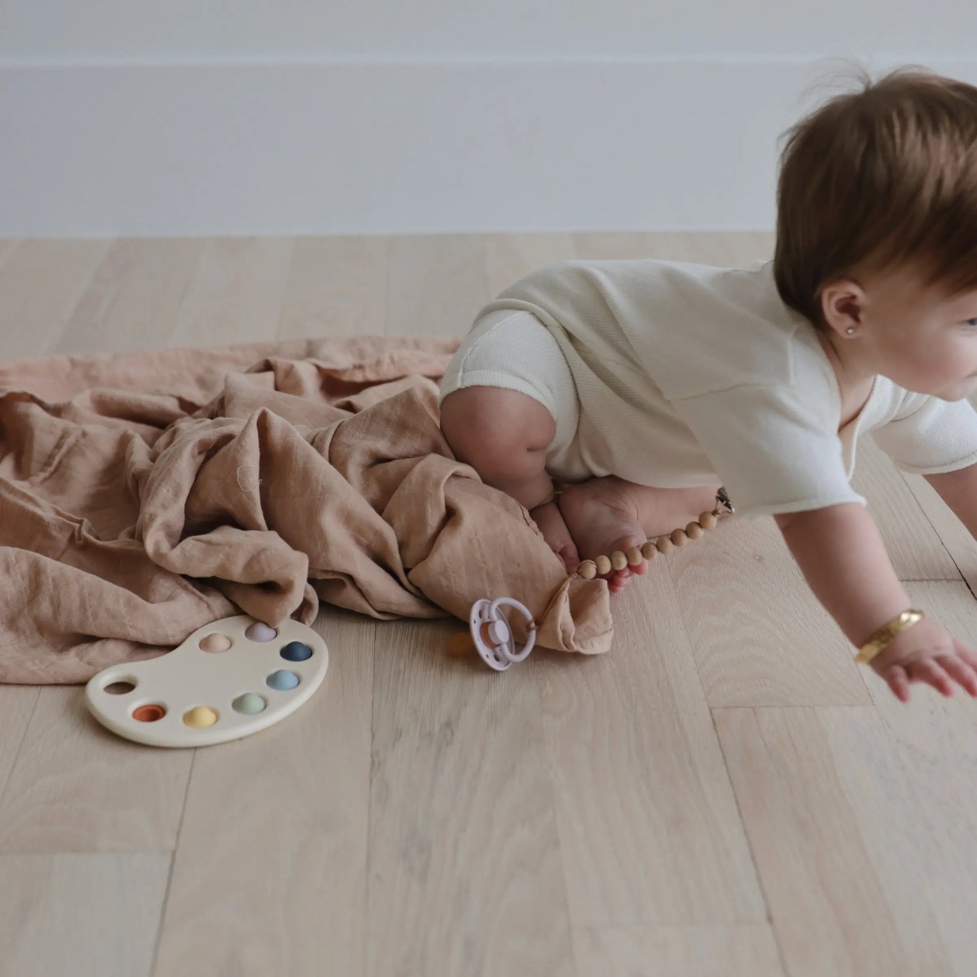 Organic Cotton Muslin Swaddle Blanket for Baby Cuddling and Nursing Mushie