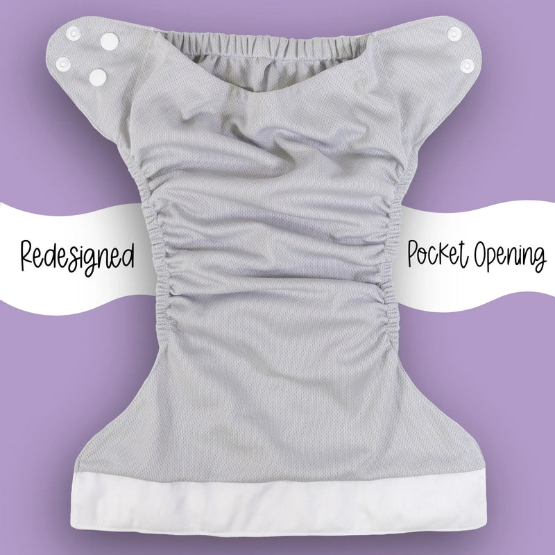 Slim Fit Pocket Cloth Diaper with redesigned pocket opening and adjustable snaps.