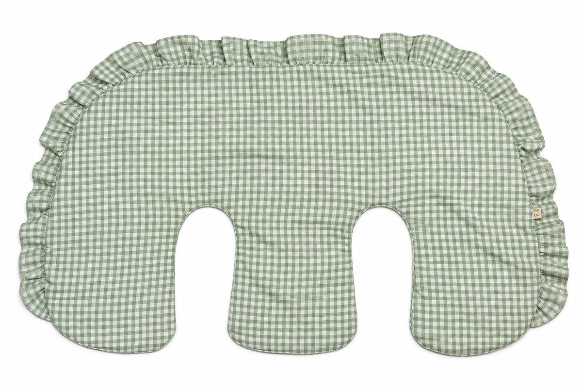 Ruffled twin nursing pillow cover made of cotton, shown fitted over a twin nursing pillow