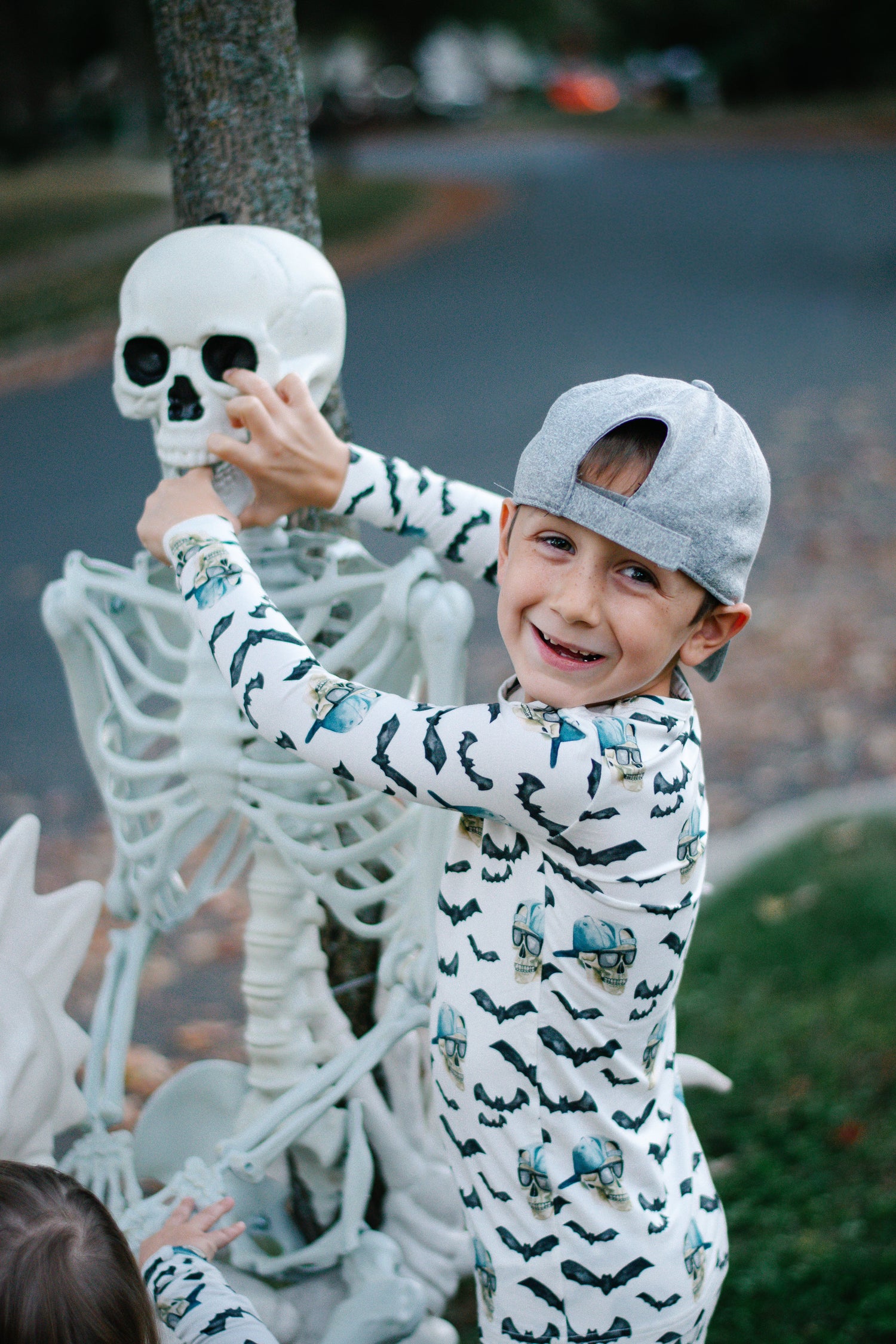 Two-piece Halloween-themed baby pajama set with a Spooky Bro print on the top and matching bottoms.