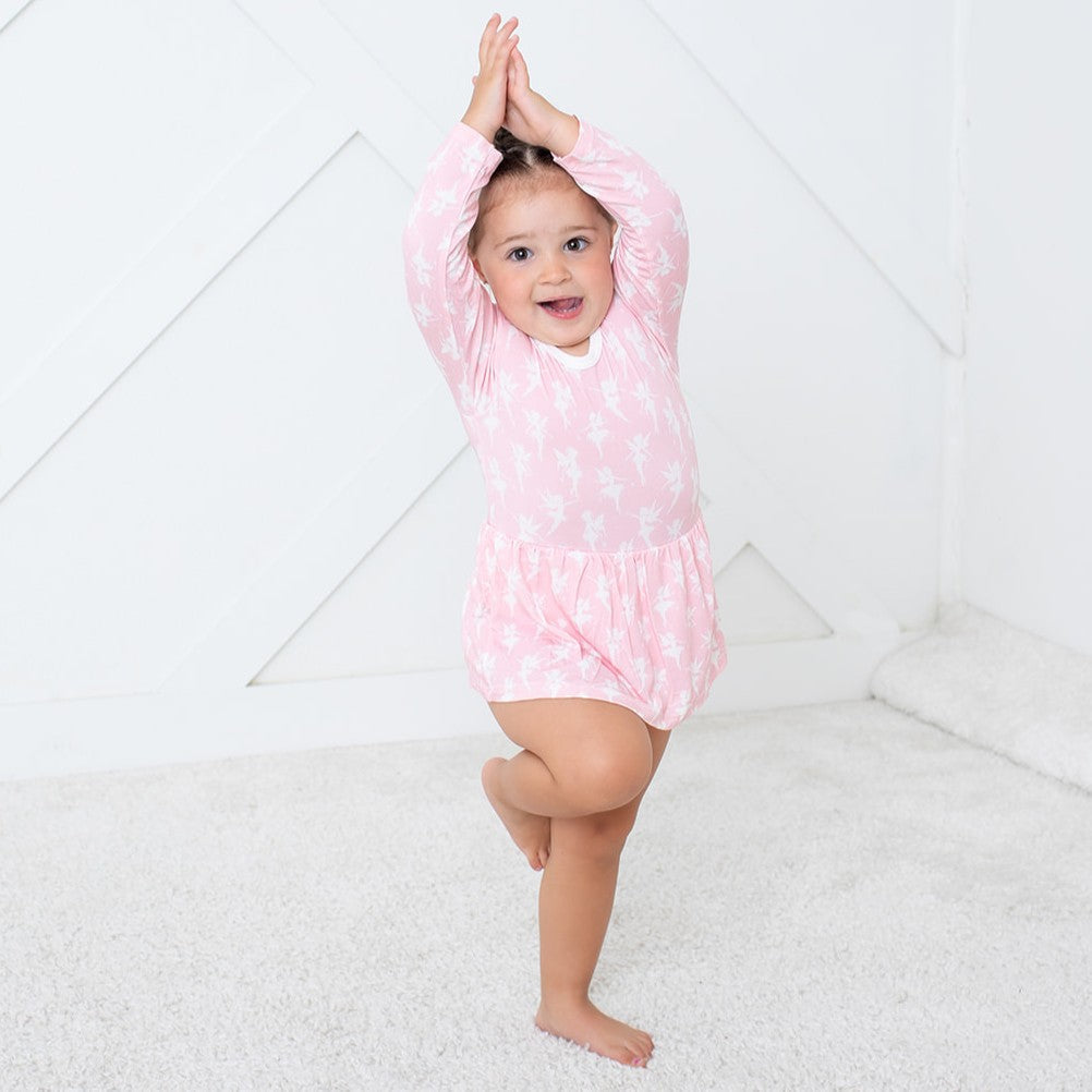 Long-sleeve bodysuit dress with a whimsical fairies print and snap closure at the inseam
