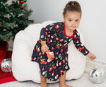 Red long-sleeve toddler dress with a Christmas tree design, twirl-ready with a full skirt