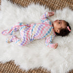 Baby footie pajamas in a soft pastel check pattern with full-length two-way zipper and footed legs.