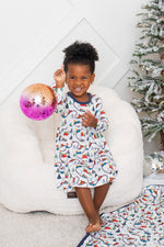 Long-sleeve toddler dress in a festive holiday print with a full twirl skirt