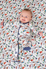 Baby footie pajamas with a holiday print, full-length zipper, and covered feet.