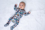 Baby footie pajamas in the Apex Dreams print with a full-length front zipper and covered feet