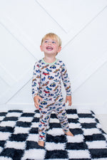 Two-piece long-sleeve pajama set with a Wild Wheels vehicle print top and matching pants
