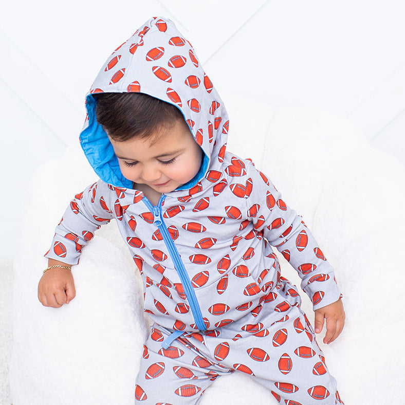 Baby zipper hoodie with a lined hood and front kangaroo pocket in the Huddle Up style