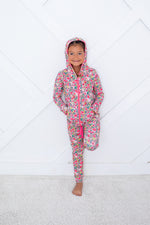 Relaxed fit baby joggers in pink Savanna Rose print with elastic waist and drawstring.