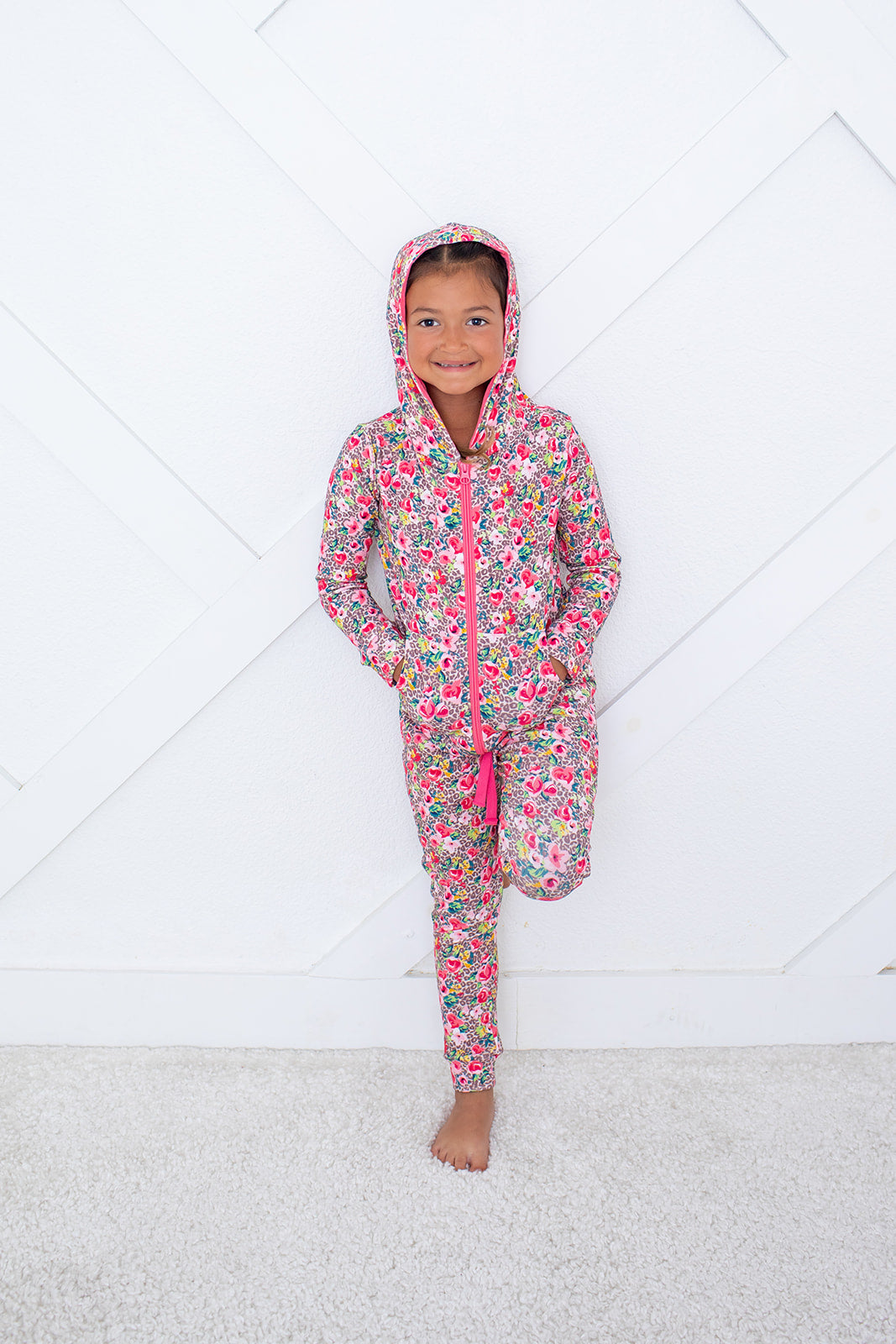 Relaxed fit baby joggers in pink Savanna Rose print with elastic waist and drawstring.
