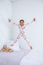 Long-sleeve two-piece pajama set with a floral mushroom print, top and matching pants.