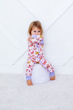 Baby coverall in pink floral ButterBloom print with long sleeves, zipper front, and covered feet