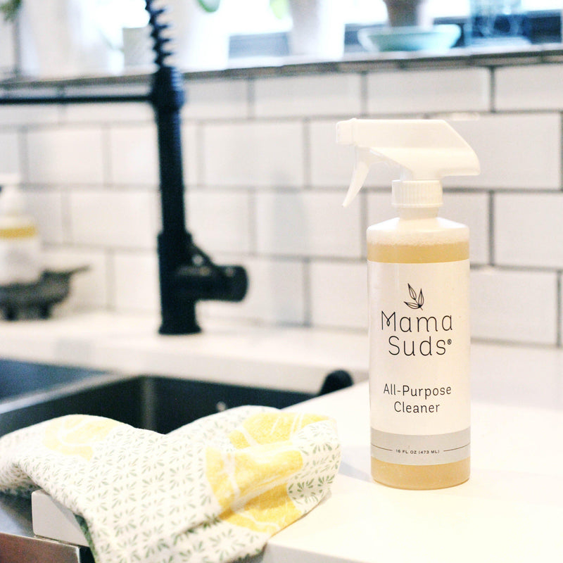 All-Purpose Cleaner Spray by MamaSuds on kitchen counter near sink.