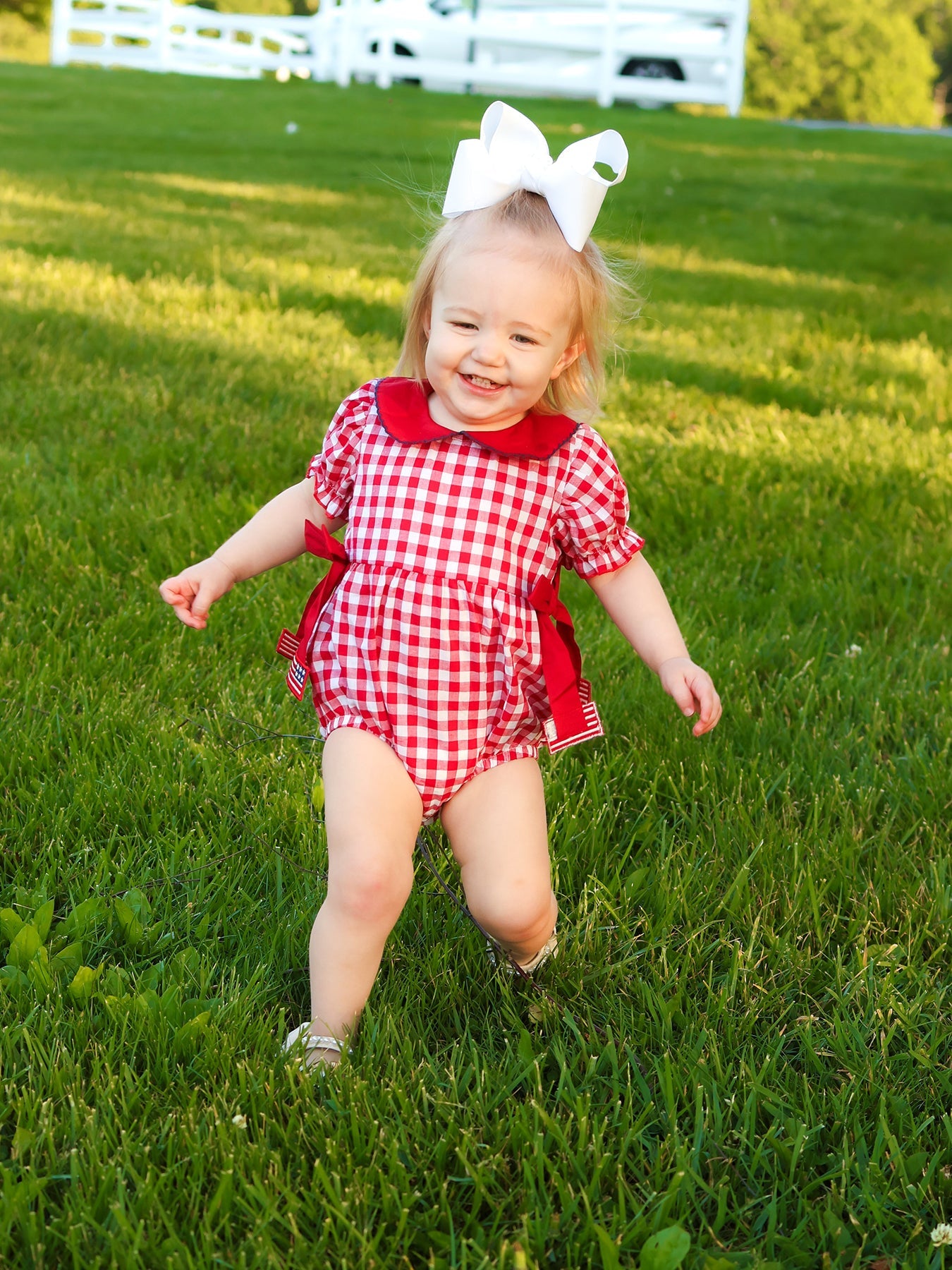 4th of July Flag Plaid Girl Peter Pan Collar Romper Bow by Rylee Faith Designs at Everetts Place