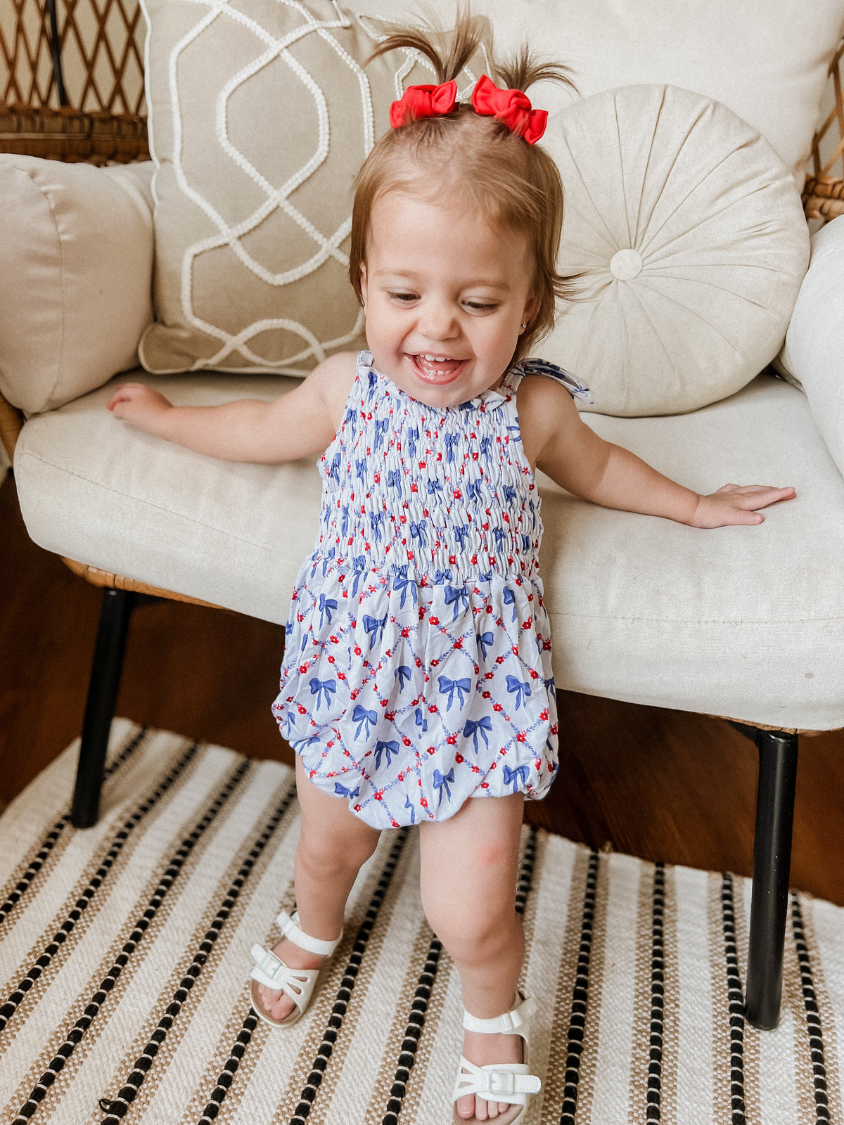 Smocked Red, White and Bows Bamboo Bubble Romper by Little Joy Co. at Everetts Place