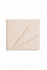 Quilted crib blanket in beige with a white floral print, hand-tufted double-sided cotton