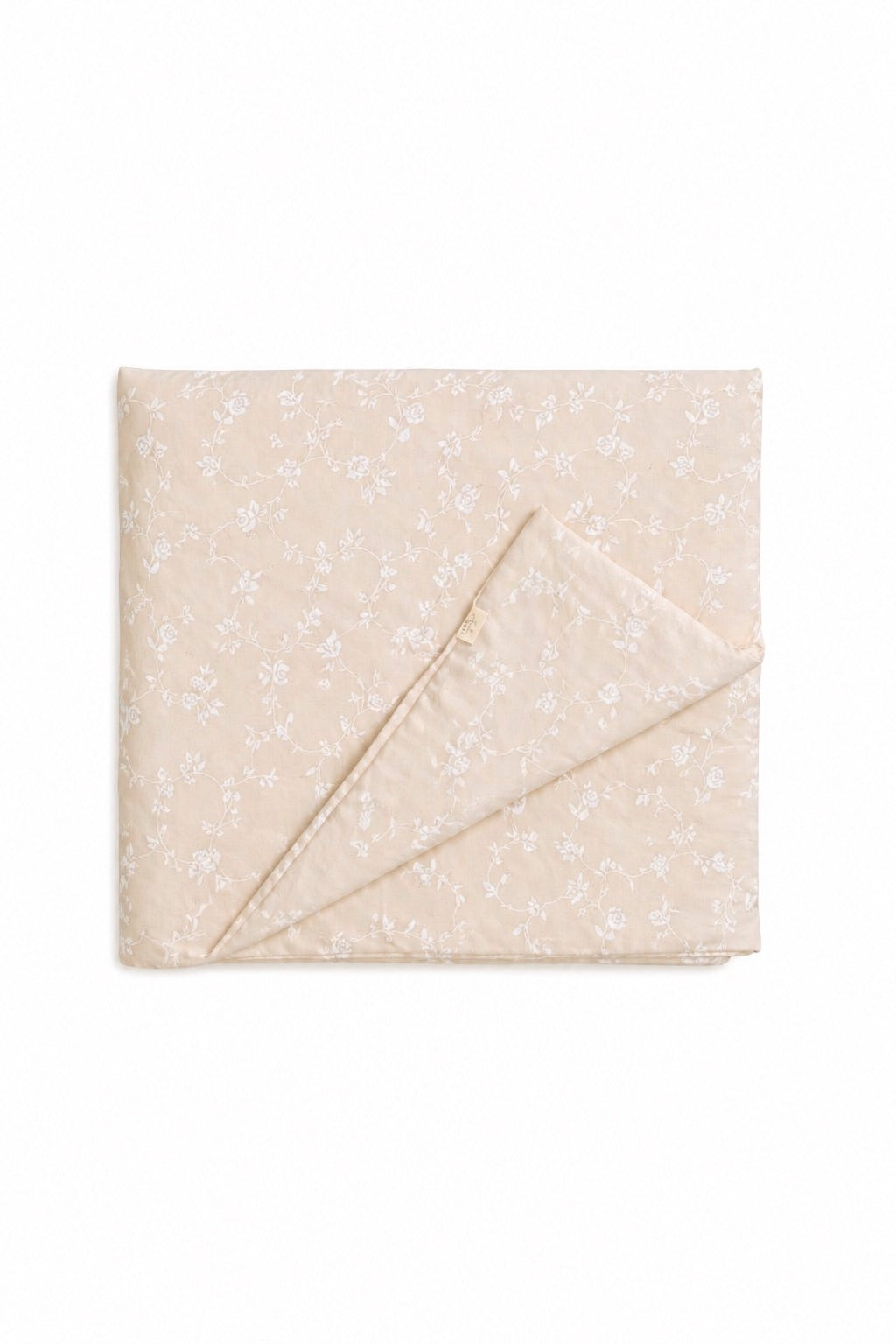 Quilted crib blanket in beige with a white floral print, hand-tufted double-sided cotton