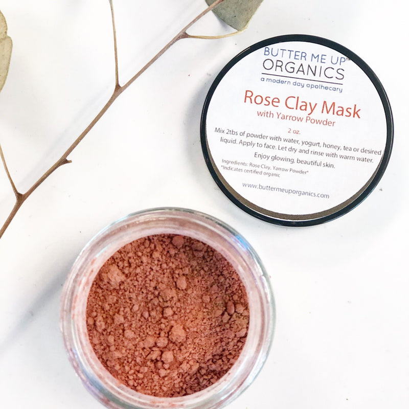 Rose Clay Face Mask with Yarrow Powder in a glass jar, promotes glowing, nourished skin.