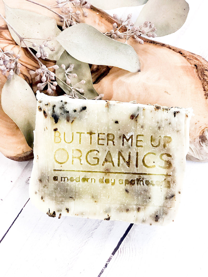 Harmony Soap bar with lavender, patchouli, and vanilla, handcrafted and organic, displayed on a natural backdrop.