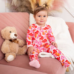 Baby footie pajamas in a heart print with full-length front zipper and footed legs