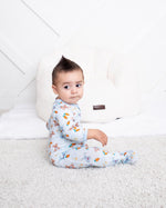 Baby footie pajamas with an allover carrot print and a full-length front zipper